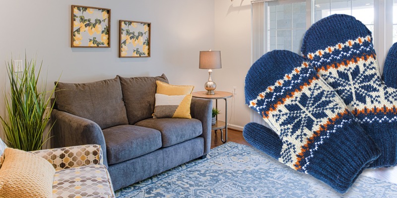 Gray couch in living room with mittens superimposed on the side of the image