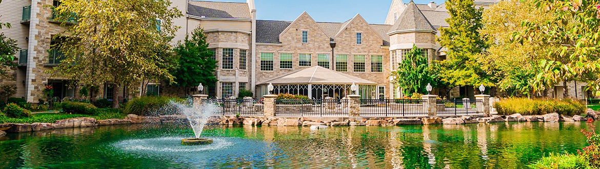 Covenant Senior Living Inverness building in Tulsa Oklahoma with a pond and fountain